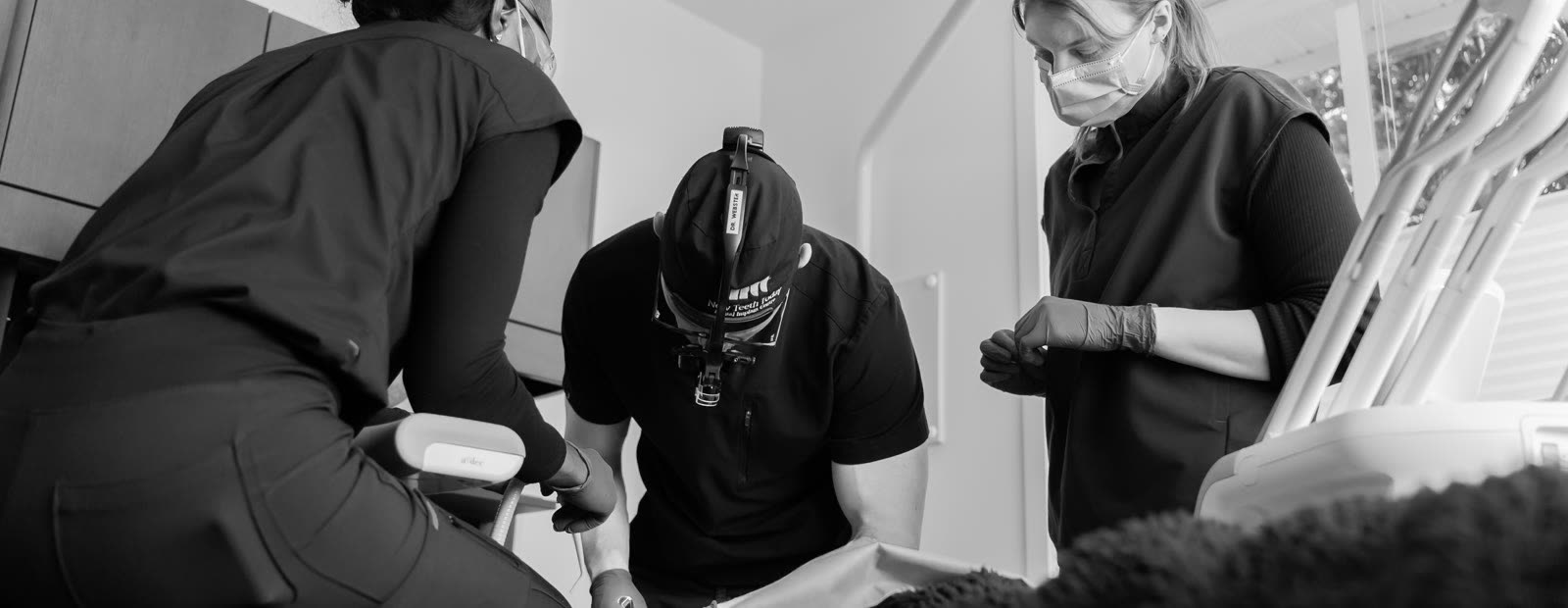 The team at work in the operatory.