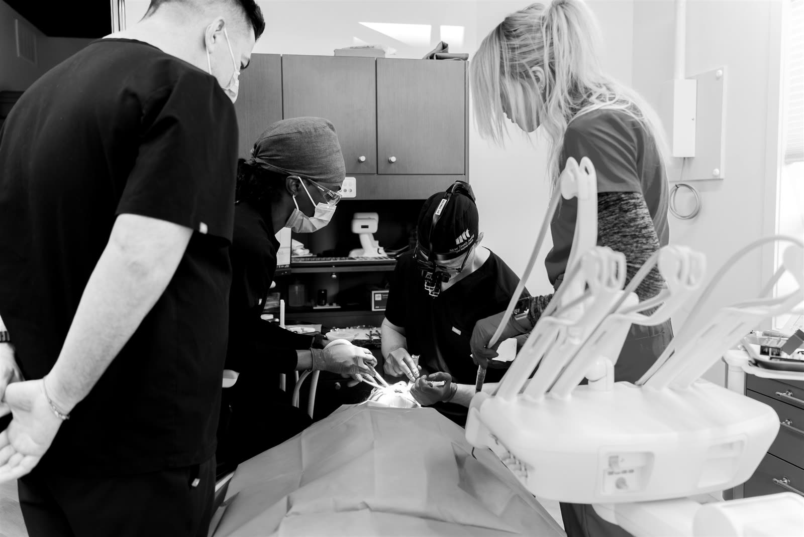 Kelowna Dental Centre team working together in an operatory.