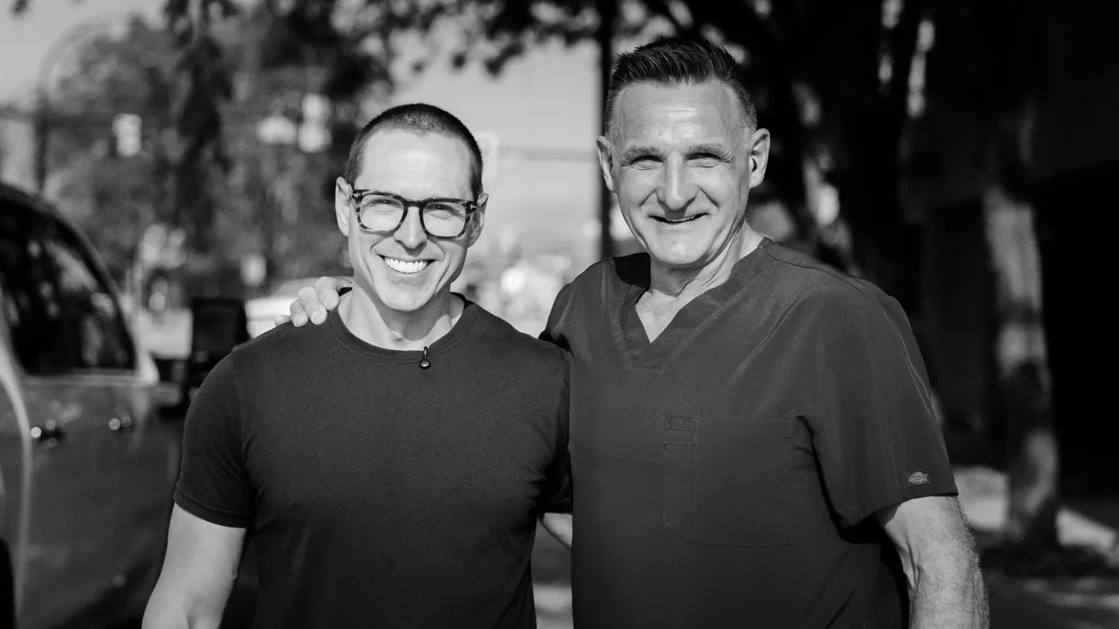 Dr. Michael Webster and Dr. Mark Wasylyk outside Tandem Dental Studio.